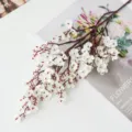 White artificial flower bouquet with brown stems for wedding home decoration and display. - White