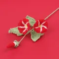 Handmade crochet red morning glory flower detail showing knitted wool texture - Red Morning Glory Branch (Meng Si)