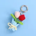 Detailed view of handmade crocheted tulip bouquet pendant with soft yarn textures - Gradient Red (Round Clasp)