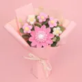 Handmade pink crochet flower bouquet with a decorative 'Love is Eternal' ribbon tie - Large Single Layer Seed Sunflower Bouquet (Medium) / Pink