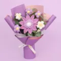 Detailed view of hand-knitted purple crochet sunflower bouquet gift for graduation - Large Single Layer Seed Sunflower Bouquet (Medium) / Purple
