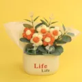Hand-knitted puff flower potted plant featuring orange and cream yarn flowers - Puff Flower Potted Plant / Gradient Yellow