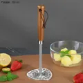 Stainless steel potato masher with wooden handle, durable kitchen tool for mashing food. - Stainless Steel Potato Masher (Triangular)