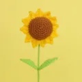 Detailed close-up showing the intricate crochet texture of a handmade yellow sunflower - Light Brown 7 Rings With Double Leaves