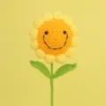 Detailed macro view of a handmade yellow crochet sunflower with a cute stitched smiley face - Yellow 7 Rings Smiley Face Bouquet