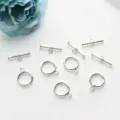 Gros plan de fermoirs à bascule OT en argent poli pour la création de bijoux DIY - 12mm / Argent