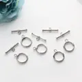 Détail macro de haute qualité de fermoirs OT en argent poli pour la création de bijoux - 12mm / Or blanc