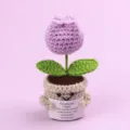 Close-up of a handmade crochet emotional support plant holding an inspirational message - Tulip / Medium Smile Pot (Beige) / Purple