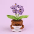 Detailed macro view of a handmade purple crochet flower pot with emotional support card - Forget-me-not / Purple