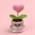 Close-up of a handmade crochet emotional plant with an inspirational quote card - Heart / Medium Smile Pot (Beige) / Pink