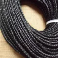 Primer plano de cordón de cuero de vaca trenzado negro para accesorios de joyería DIY - 6mm / Negro
