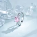 Elegant silver hoop earring featuring a large pink zircon center and crystal flower petals - Four-Petal Flower Style (A1431-2) / 1 Piece/Pack / Light Pink