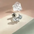 Elegante titanium oorknop met heldere zirkonia en een lichtblauwe ster edelsteen. - Ster Meteoor Stijl (Buitendraad) / Enkel Stuk (Roestvrij Stalen Staaf) / Lichtzeeblauw