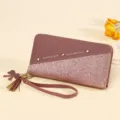 Elegant pink glitter and PU leather long women's wallet with wrist strap and tassel charm - Deep Pink