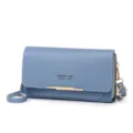 Close-up of a blue double-layer multi-functional crossbody phone bag with gold accents - Blue