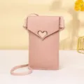 Stylish pink mini PU leather crossbody cell phone bag featuring heart-shaped buckle - Light Pink