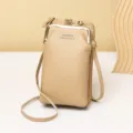 Elegant beige mini crossbody cell phone bag featuring a golden clasp and zipper closure. - Vertical Kiss-Lock Mobile Phone Bag / Apricot
