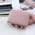 Compact pink litchi grain leather card holder with double zippers and accordion slots - Pink