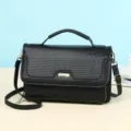 Classic black textured leather handbag for office work with gold hardware accents - 20x7x12cm / Black