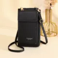 Elegante zwarte lederen verticale crossbody telefoontas voor dames met gouden accenten - Zwart