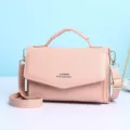 Roze minimalistische dames crossbody telefoontas met handvat en verstelbaar - Lichtroze