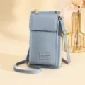 Lichtblauwe crossbody telefoontas voor dames met een verfijnde lychee-structuur - Lichtblauw