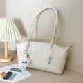 Minimalist cream PU leather tote bag with fluffy character charm for stylish commute - White