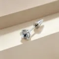 Titanium piercing stud featuring a silver dragon claw clutching a dark bead - Dragon Claw with Spike (Titanium Alloy Screw) / Clear White