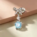 Elegant silver bow knot cartilage stud earring with light blue zircon dangle charm - A1278-5# (Stainless Steel Post External Thread)