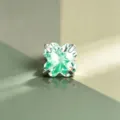 Clover-shaped titanium stud earring featuring a vibrant green lucky-cut zircon gemstone. - Titanium Alloy External Spiral Style (A1194-1)