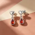 Boucles d'oreilles goutte d'eau rouge avec cœur en acier titane argenté élégant - Style à Vis Extérieure en Alliage de Titane / Rouge