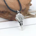 Detailed macro view of Viking raven skull pendant with engraved Vegvisir symbol - Crow Skull