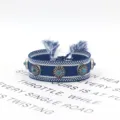 Handgewebtes blaues Retro-Armband mit Metall-Türkis-Nieten und Quasten. - Stil 12