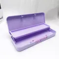 Close-up detail of the purple double-layer plastic pencil case with combination lock mechanism. - Purple