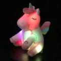 Gedetailleerd overzicht van LED eenhoorn pluche met regenbooglichten - Wit / 30cm