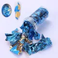 Blue and gold metallic foil flakes for DIY nail art decoration in a transparent bottle - Blue Gold Two-tone