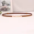 Elegant thin brown leather dress belt with chic pearl gold buckle detail for women fashion. - Camel