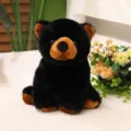 Nahaufnahme des realistischen schwarzen Bären-Plüschtiers mit weichem Fell und Details - 20cm / Sitzender Stil / Schwarz
