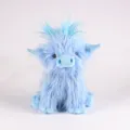 Detailansicht eines zotteligen blauen Highland-Kuh-Plüschtiers mit langem Fell - 25cm / Blau