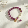Natural purple amethyst beaded bracelet featuring pearls and a golden fox charm detail - Style 11