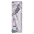 Professional window track and crevice cleaning brush with hard bristles in retail packaging. - White