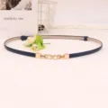 Thin navy blue women belt with gold pearl buckle detail closeup view for dress and sweater - Blue
