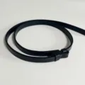 Close-up detail of a slim black leather belt with neat stitching, elegant and versatile. - Dark Blue