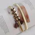 Gold metal stretch waist chain with four heart buckles, stylish dress and sweater accessory. - #290 Gold