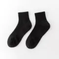 Black athletic crew socks with thick towel sole for men, breathable sports and basketball socks. - One Size (EU 36-44) / Black (Crew Length)