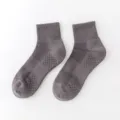 Dark grey men's mid-tube athletic socks with breathable mesh and cushioned towel bottom. - One Size (EU 36-44) / Graphite (Crew Length)