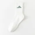 White mid-calf cotton socks for men and women, featuring stylish green mountain embroidery. - One Size (Sizes 38-44) / White