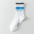 White mid-calf athletic socks with blue text and black ribbed cuff, comfortable cotton style. - Women's One Size (Size 36-41) / Black Cuffs