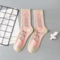 Street style cotton mid-tube socks featuring a cute robot graphic and trendy pink color blocking design. - Robot One Size / Size 9