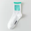 Trendy white cotton mid-tube socks with green box graphic and stylish ankle print. - Women's One Size (Size 36-41) / Green Cuff